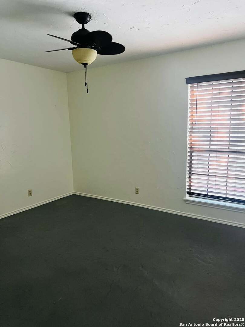 8655 Datapoint, Unit 404 San Antonio, TX 78229 - Photo 20 of 25 a view of an empty room with a window