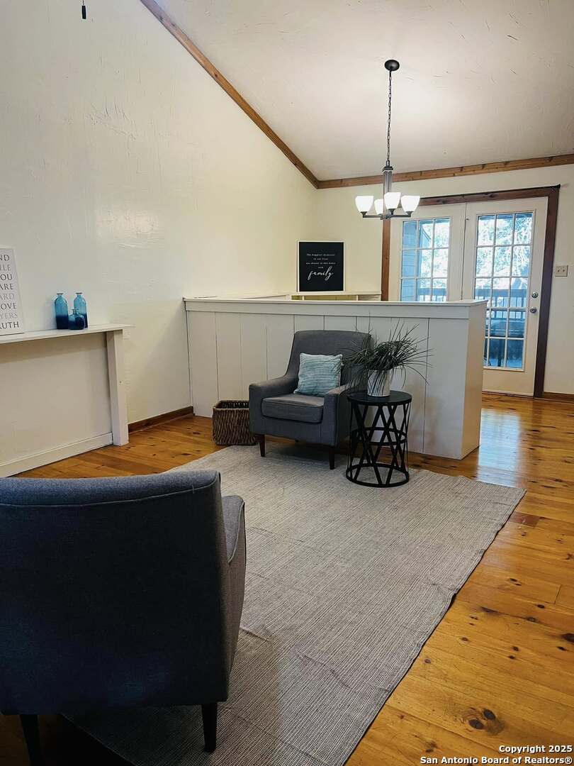 8655 Datapoint, Unit 404 San Antonio, TX 78229 - Photo 2 of 25 a view of a livingroom with furniture flat screen tv and window