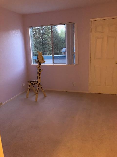 1410 Bel Air Drive, Unit 304 Concord, CA 94521 - Photo 16 of 23 an empty room with a window
