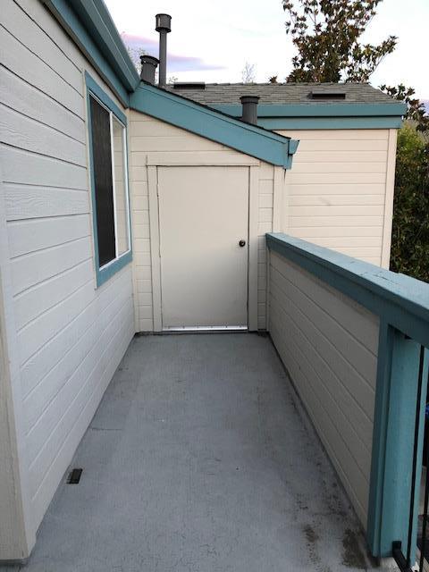 1410 Bel Air Drive, Unit 304 Concord, CA 94521 - Photo 20 of 23 a view of house with outdoor space