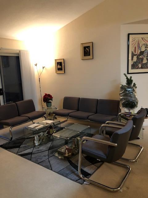 1410 Bel Air Drive, Unit 304 Concord, CA 94521 - Photo 5 of 23 a view of a livingroom with furniture and a couch