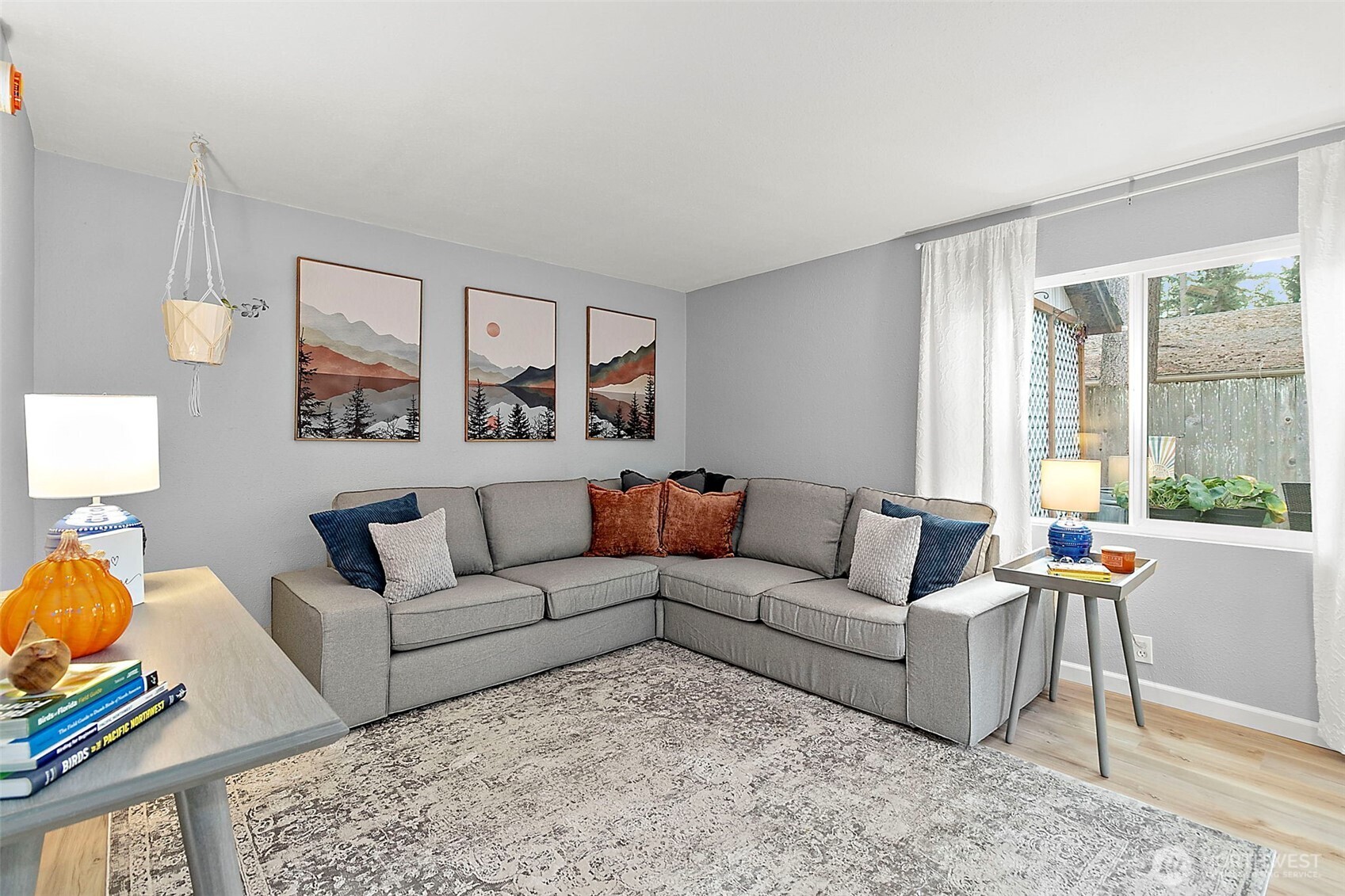 26104 195th Place Southeast Covington, WA 98042 - Photo 14 of 29 a living room with furniture and a large window