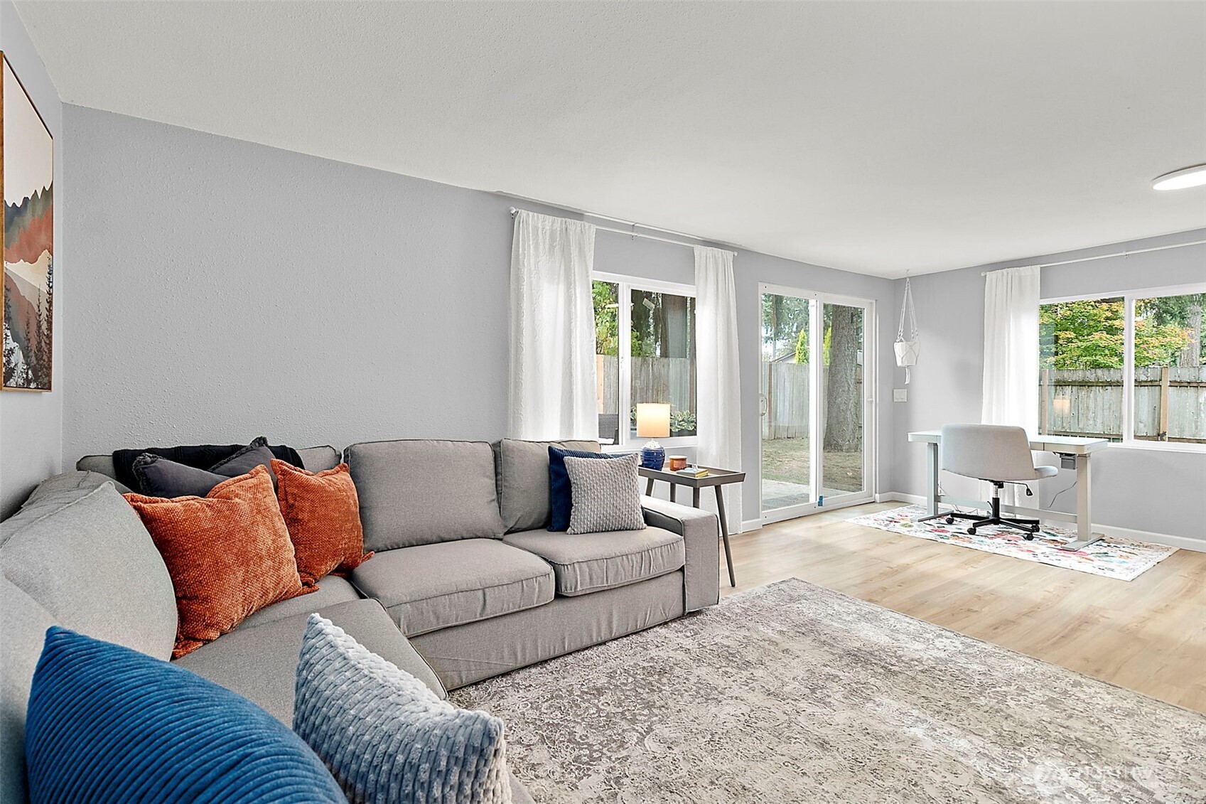 26104 195th Place Southeast Covington, WA 98042 - Photo 15 of 29 a living room with furniture and a large window