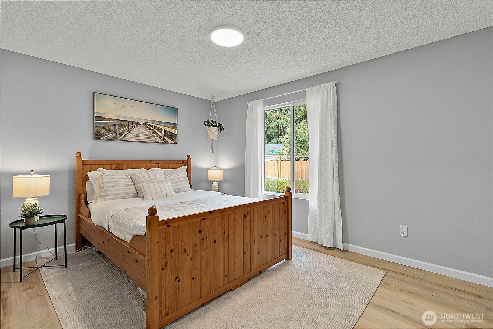 26104 195th Place Southeast Covington, WA 98042 - Photo 20 of 29 a bedroom with a bed and window