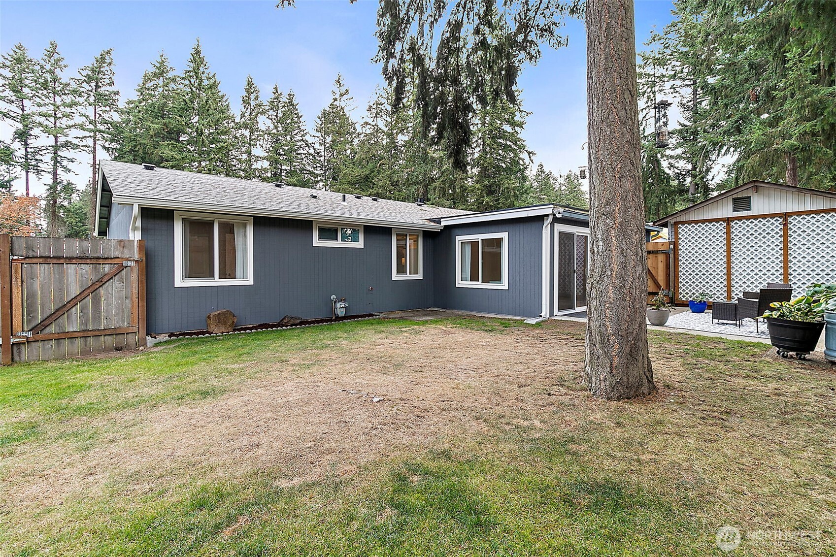 26104 195th Place Southeast Covington, WA 98042 - Photo 24 of 29 a house with trees in front of it