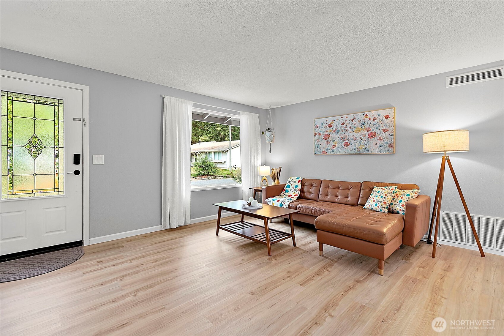 26104 195th Place Southeast Covington, WA 98042 - Photo 3 of 29 a living room with furniture and a window