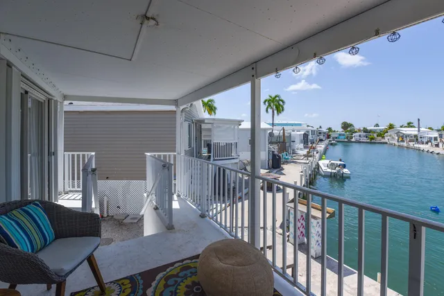 a view of balcony with furniture