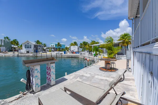a view of a patio in a backyard