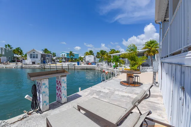 a view of a patio in a backyard