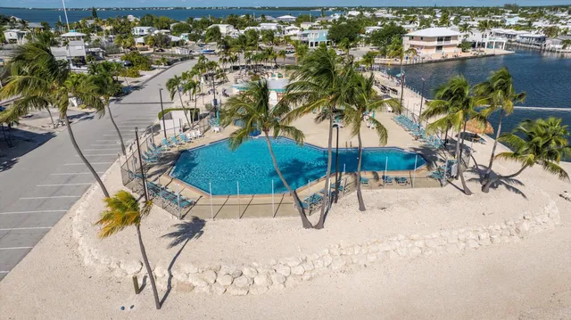a view of a swimming pool and a chair