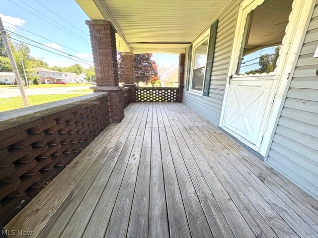 1919 Parkman Road Northwest Warren, OH 44485 - Photo 33 of 41 Full length Solid Porch for those relaxing sittings