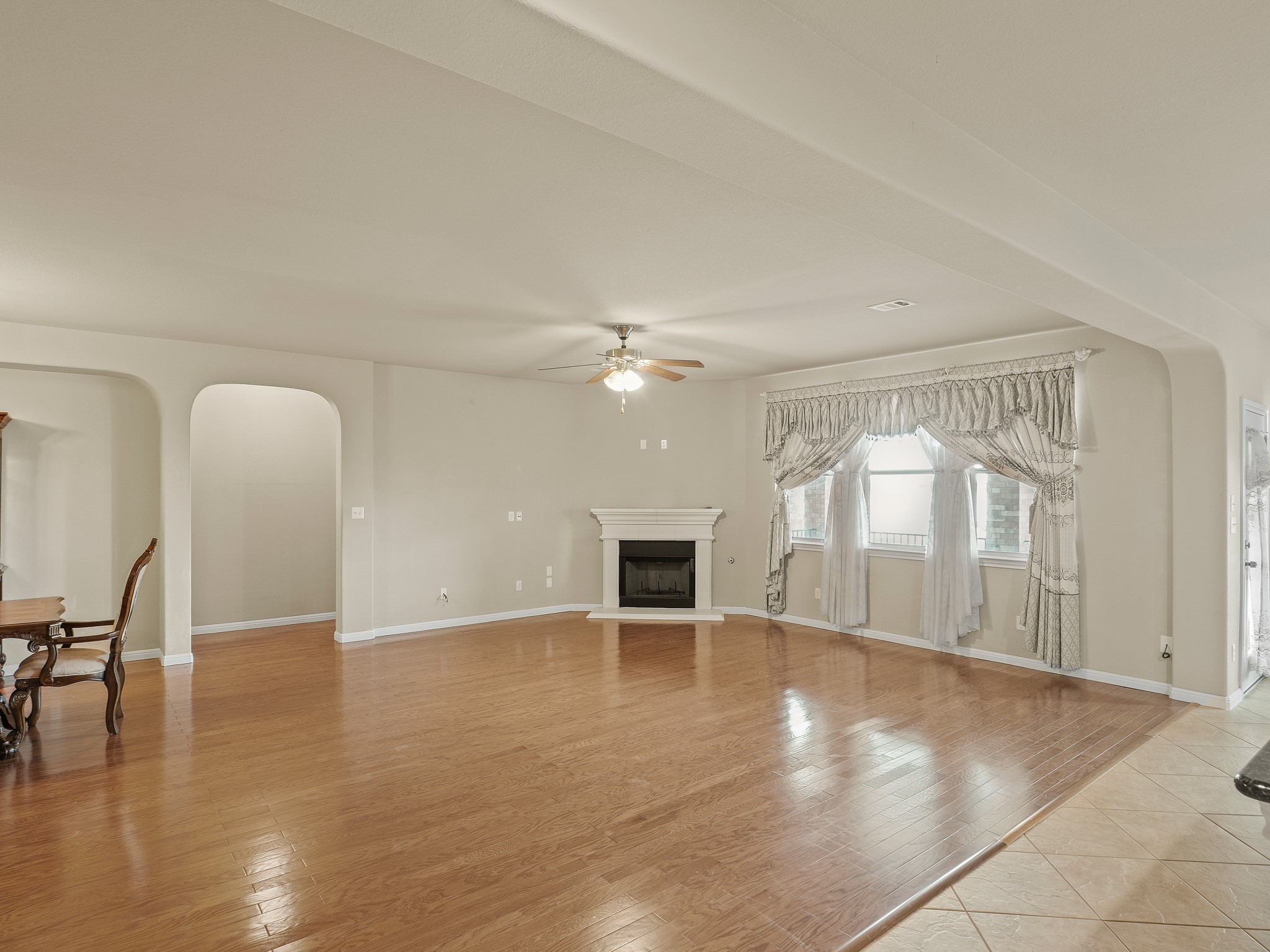 17805 Silent Harbor Loop Pflugerville, TX 78660 - Photo 30 of 34 wooden floor in an empty room with a window