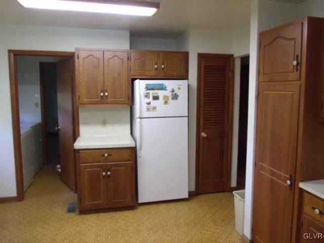 899 Engler Road Nazareth, PA 18064 - Photo 4 of 16 a white refrigerator freezer sitting in a kitchen