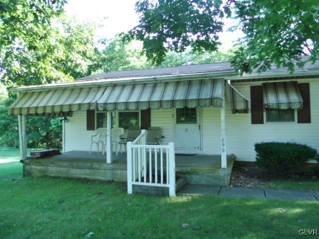 899 Engler Road Nazareth, PA 18064 - Photo 10 of 16 a view of a chair and table in backyard of the house