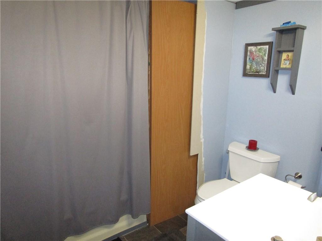 69 South Summit Road Greenville, PA 16125 - Photo 14 of 17 a bathroom with a sink and a toilet