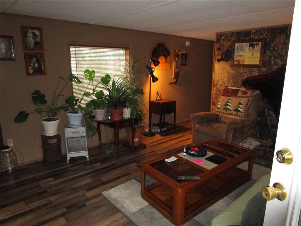 69 South Summit Road Greenville, PA 16125 - Photo 7 of 17 a living room with furniture and a fireplace