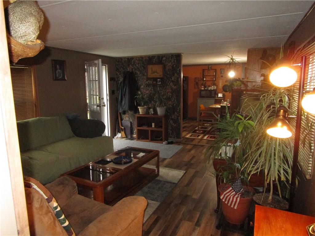 69 South Summit Road Greenville, PA 16125 - Photo 8 of 17 a living room with furniture and a fireplace