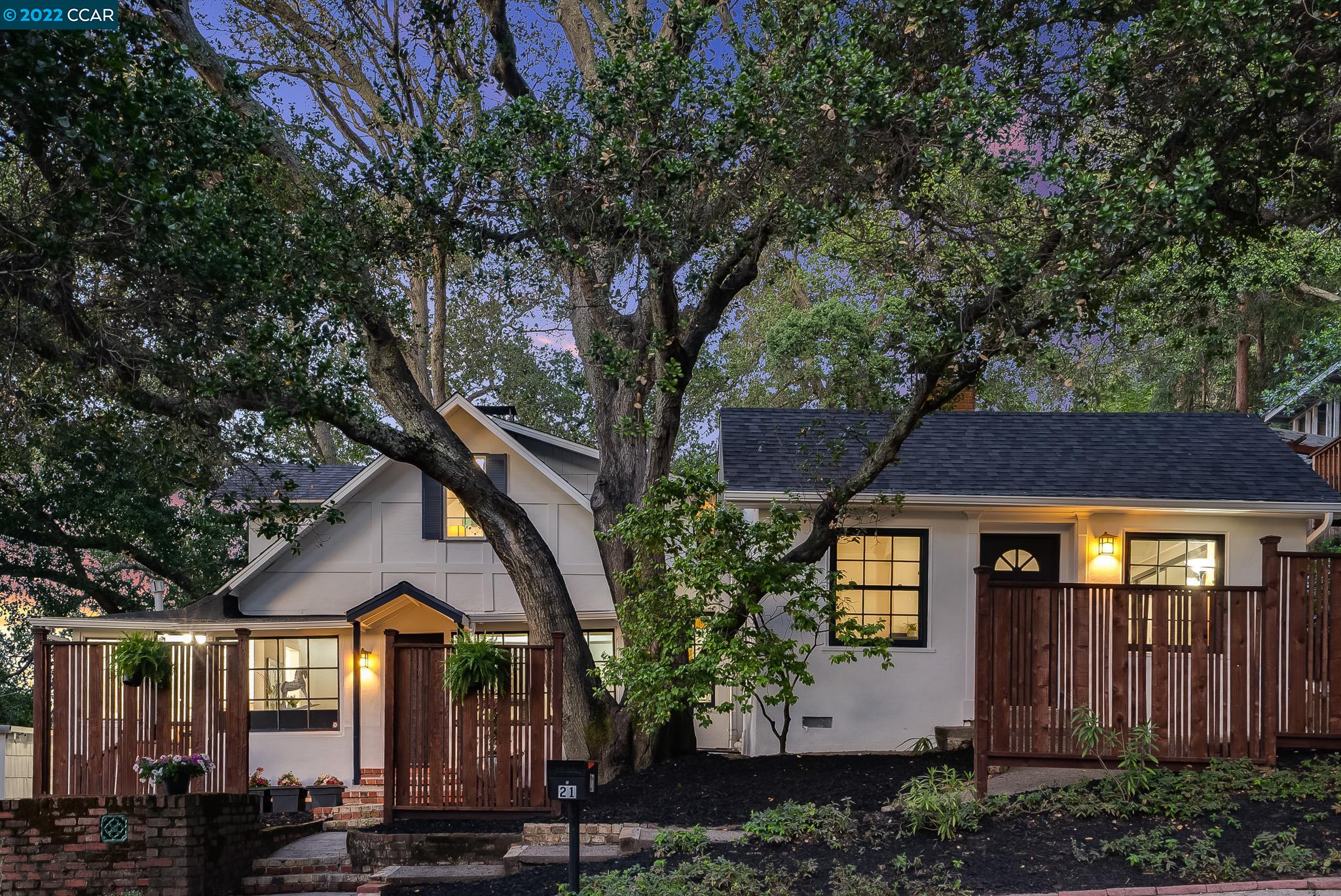 21 Spring Road Orinda, CA 94563 - Photo 1 of 1 a front view of a house with garden