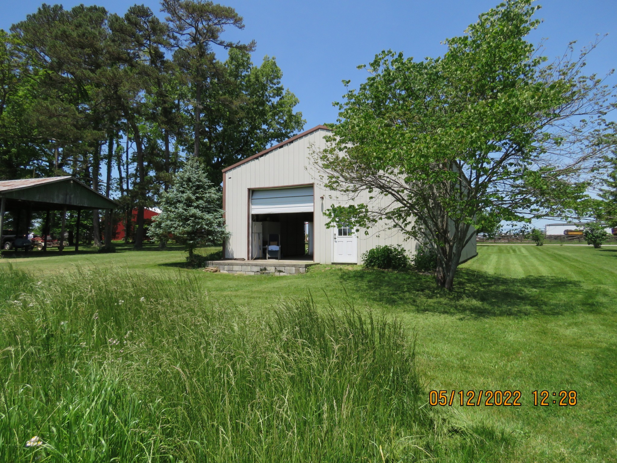 1689 Meister Hills Road Deer Lodge, TN 37726 - Photo 11 of 19 a view of house with garden space and trees