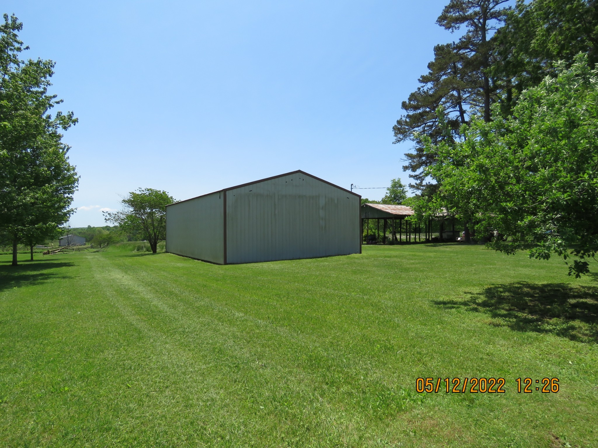 1689 Meister Hills Road Deer Lodge, TN 37726 - Photo 6 of 19 a backyard of a house with lots of green space