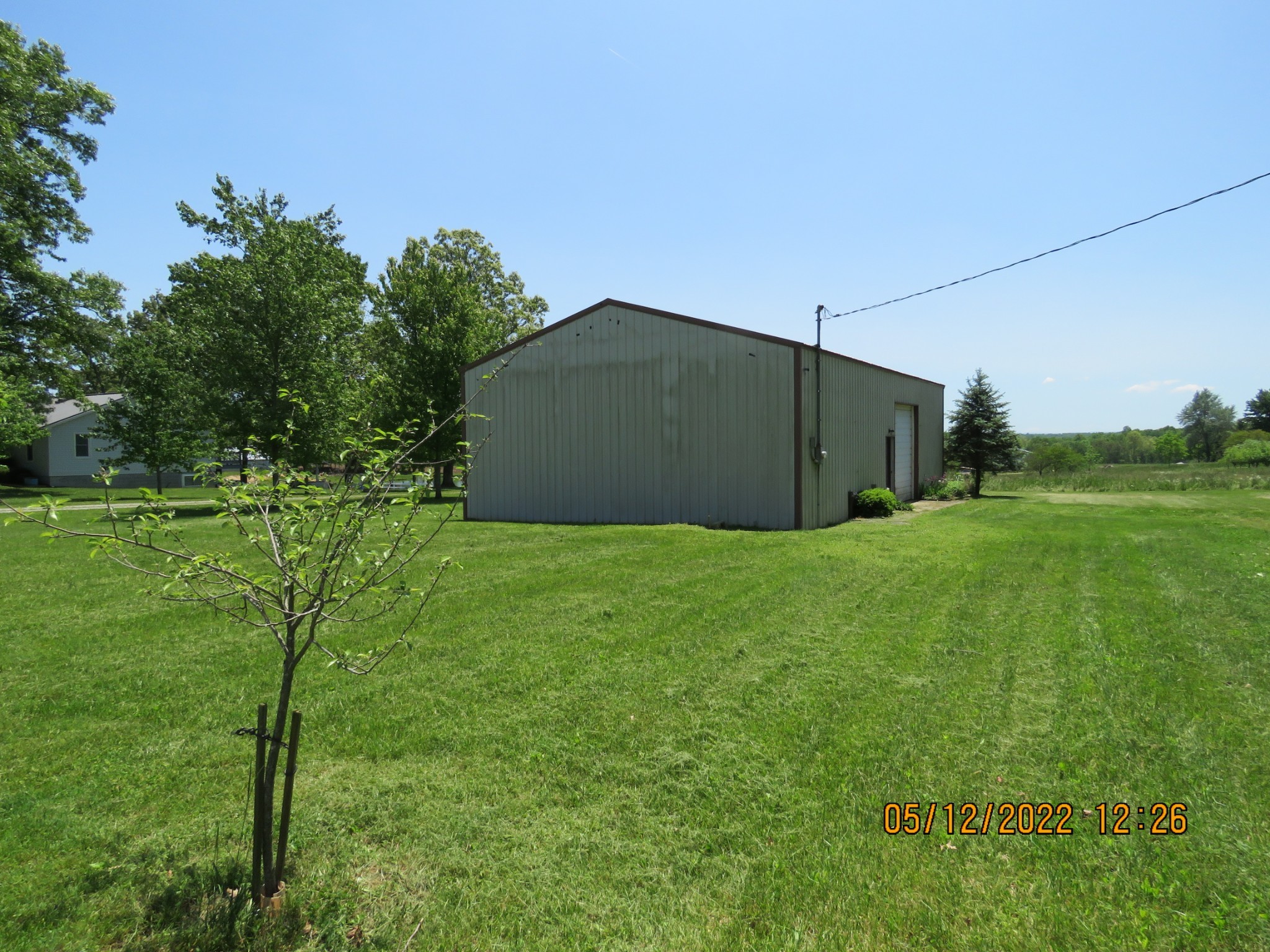 1689 Meister Hills Road Deer Lodge, TN 37726 - Photo 8 of 19 a backyard of a house with lots of green space