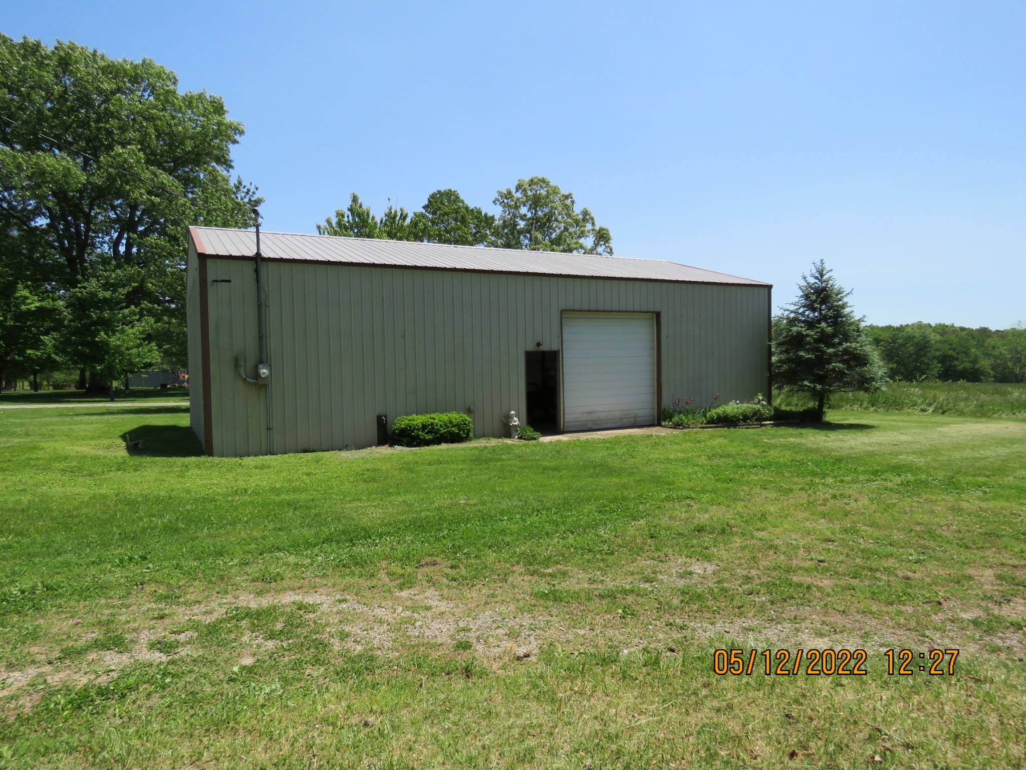 1689 Meister Hills Road Deer Lodge, TN 37726 - Photo 9 of 19 a backyard of a house with lots of green space