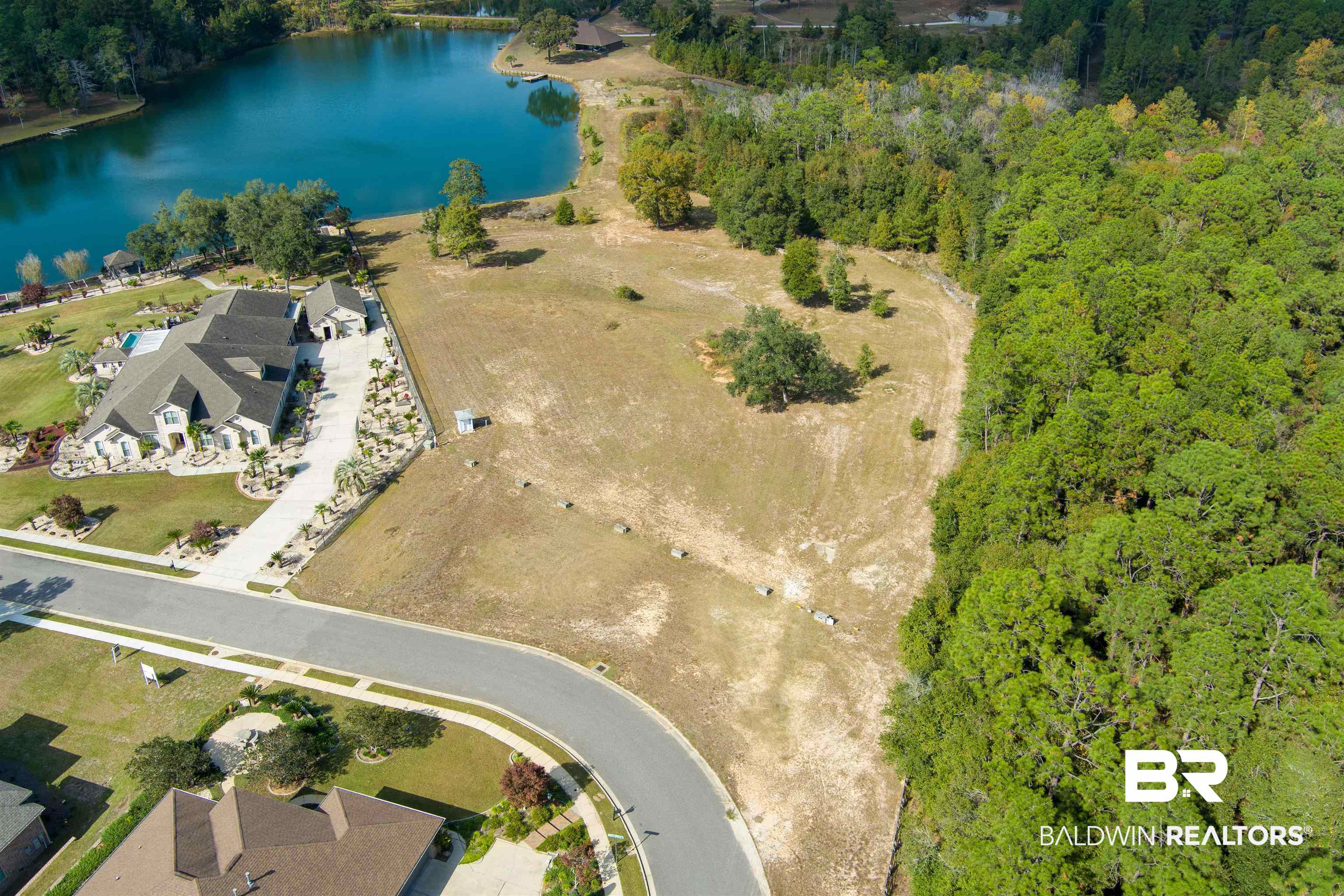 8512 Crepe Myrtle Court Mobile, AL 36619 - Photo 6 of 10 Aerial overview of property's location featuring a large body of water and a forest