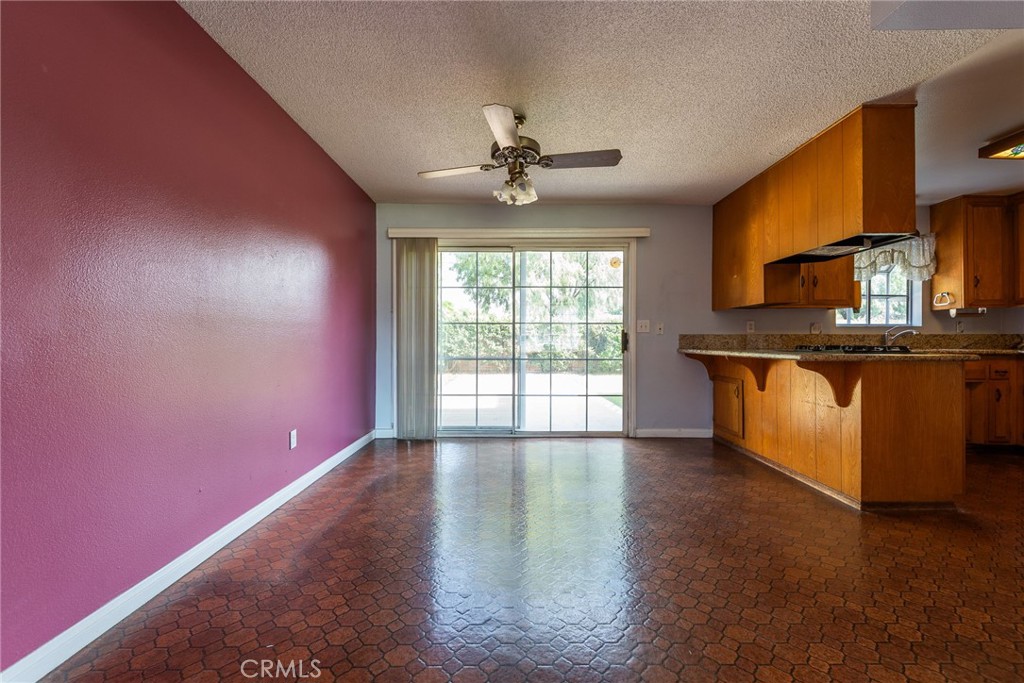 5171 Merrill Avenue Riverside, CA 92504 - Photo 11 of 34 a view of a kitchen with a sink and a window