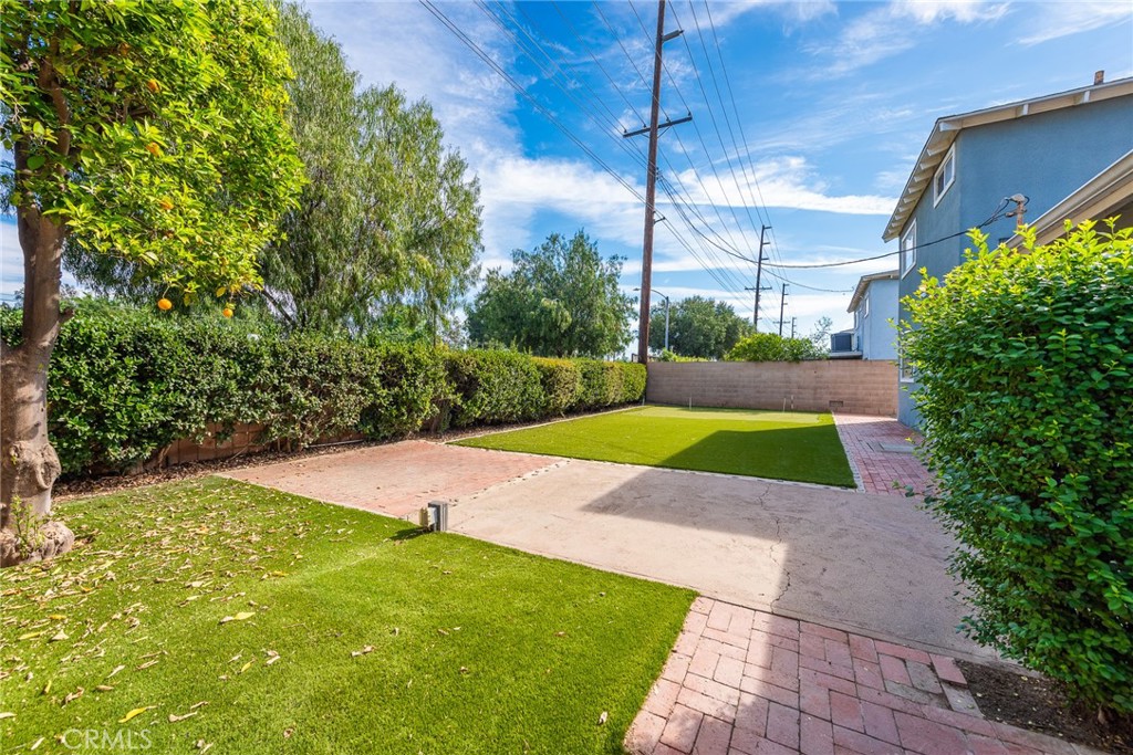 5171 Merrill Avenue Riverside, CA 92504 - Photo 31 of 34 a view of a yard with swimming pool