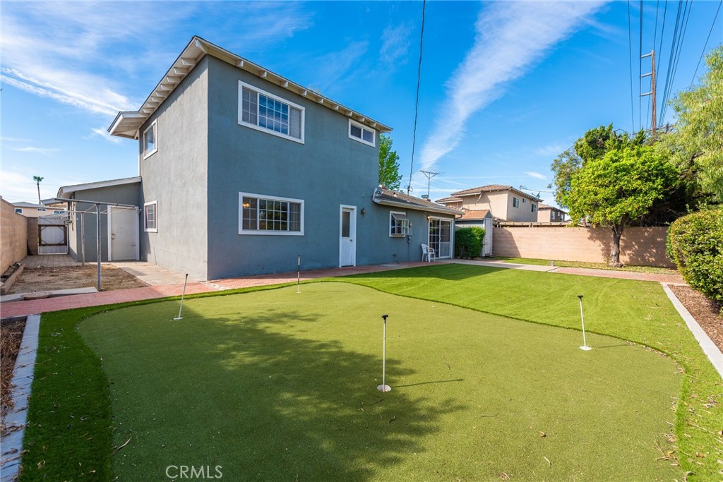 5171 Merrill Avenue Riverside, CA 92504 - Photo 4 of 34 a house view with swimming pool in front of it