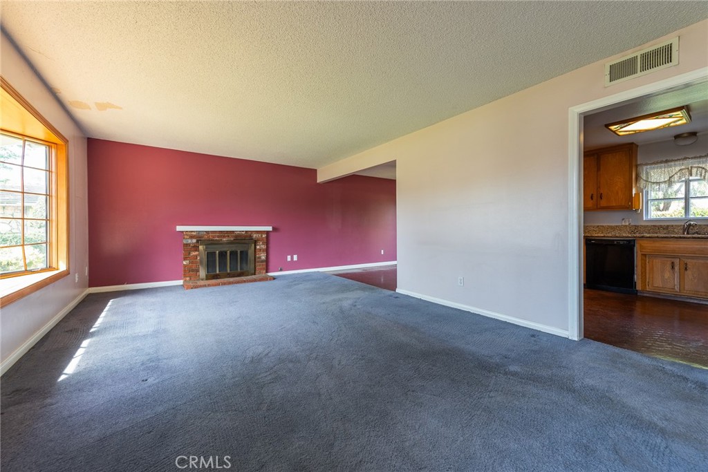 5171 Merrill Avenue Riverside, CA 92504 - Photo 8 of 34 an empty room with windows