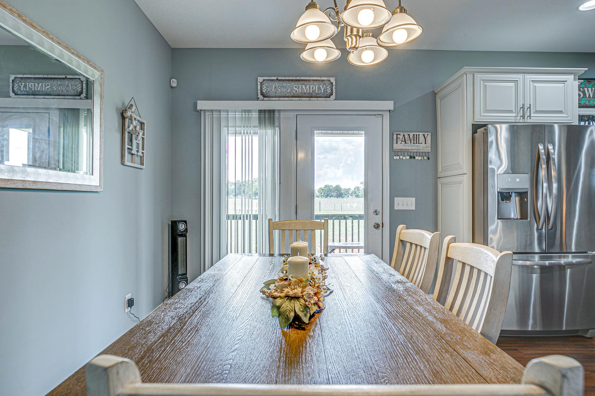 3269 Midland Road Bell Buckle, TN 37020 - Photo 12 of 30 a view of dining room and wooden floor