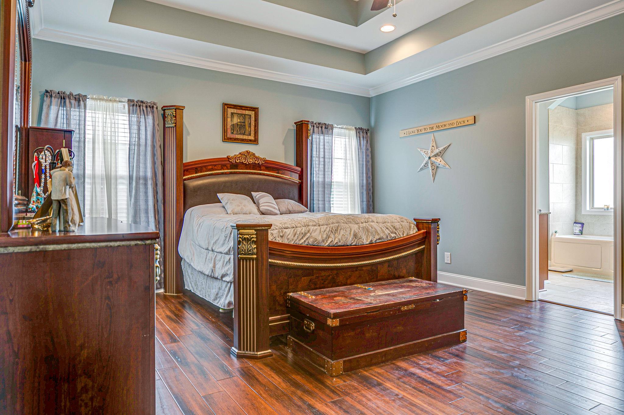 3269 Midland Road Bell Buckle, TN 37020 - Photo 18 of 30 a bedroom with a bed and wooden floor