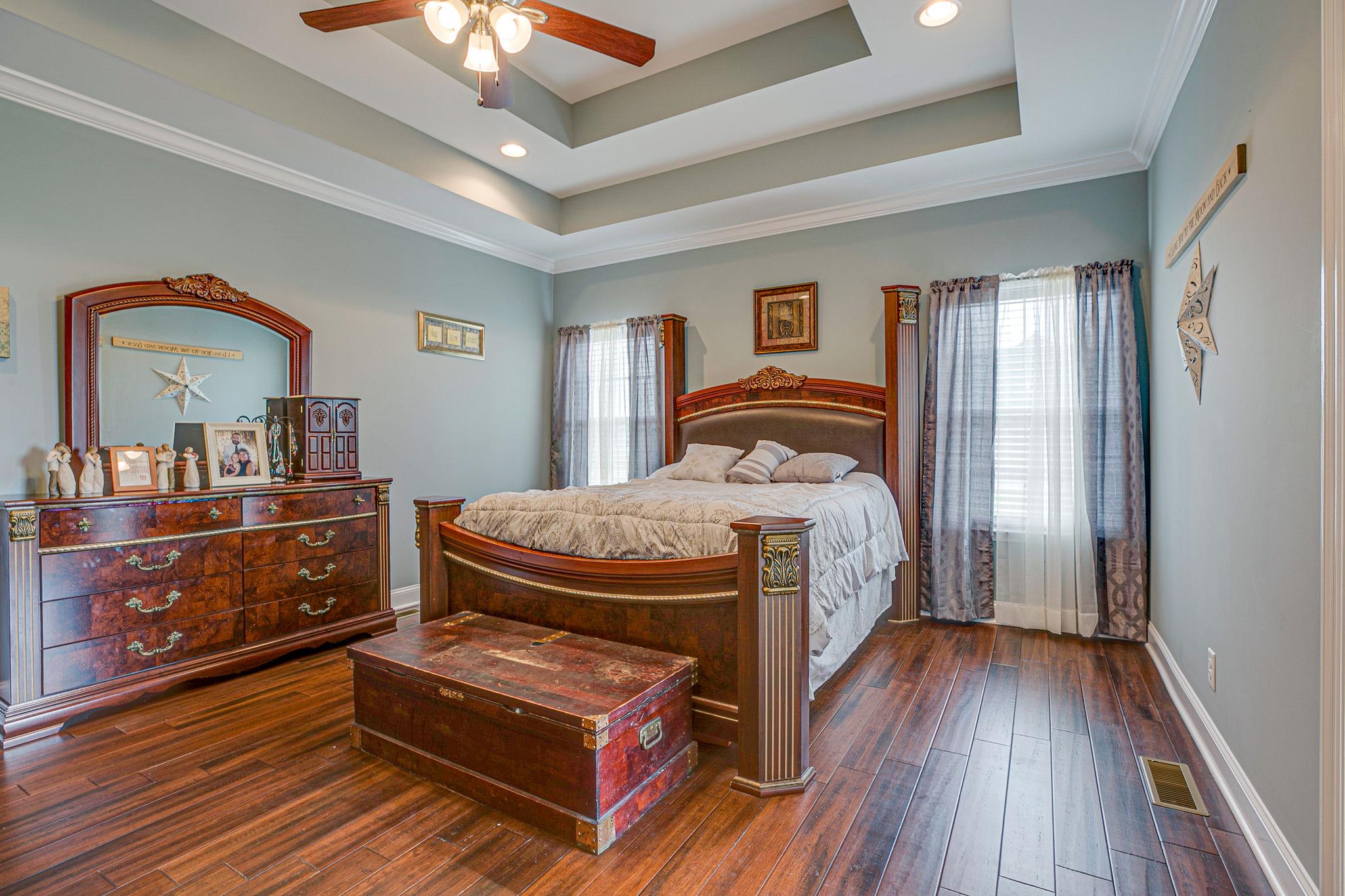 3269 Midland Road Bell Buckle, TN 37020 - Photo 19 of 30 a bedroom with a bed and wooden floor