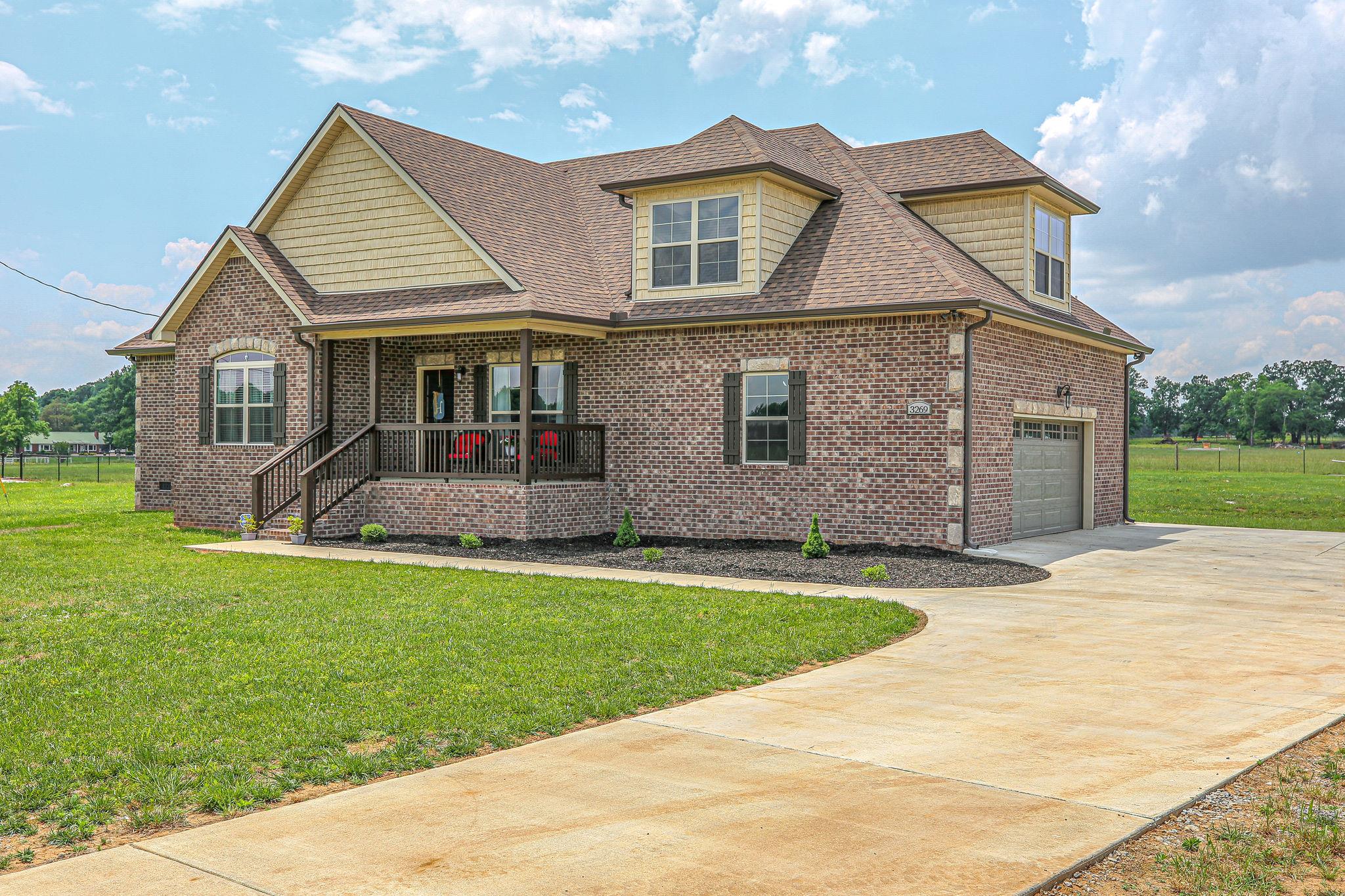 3269 Midland Road Bell Buckle, TN 37020 - Photo 2 of 30 a front view of a house with yard