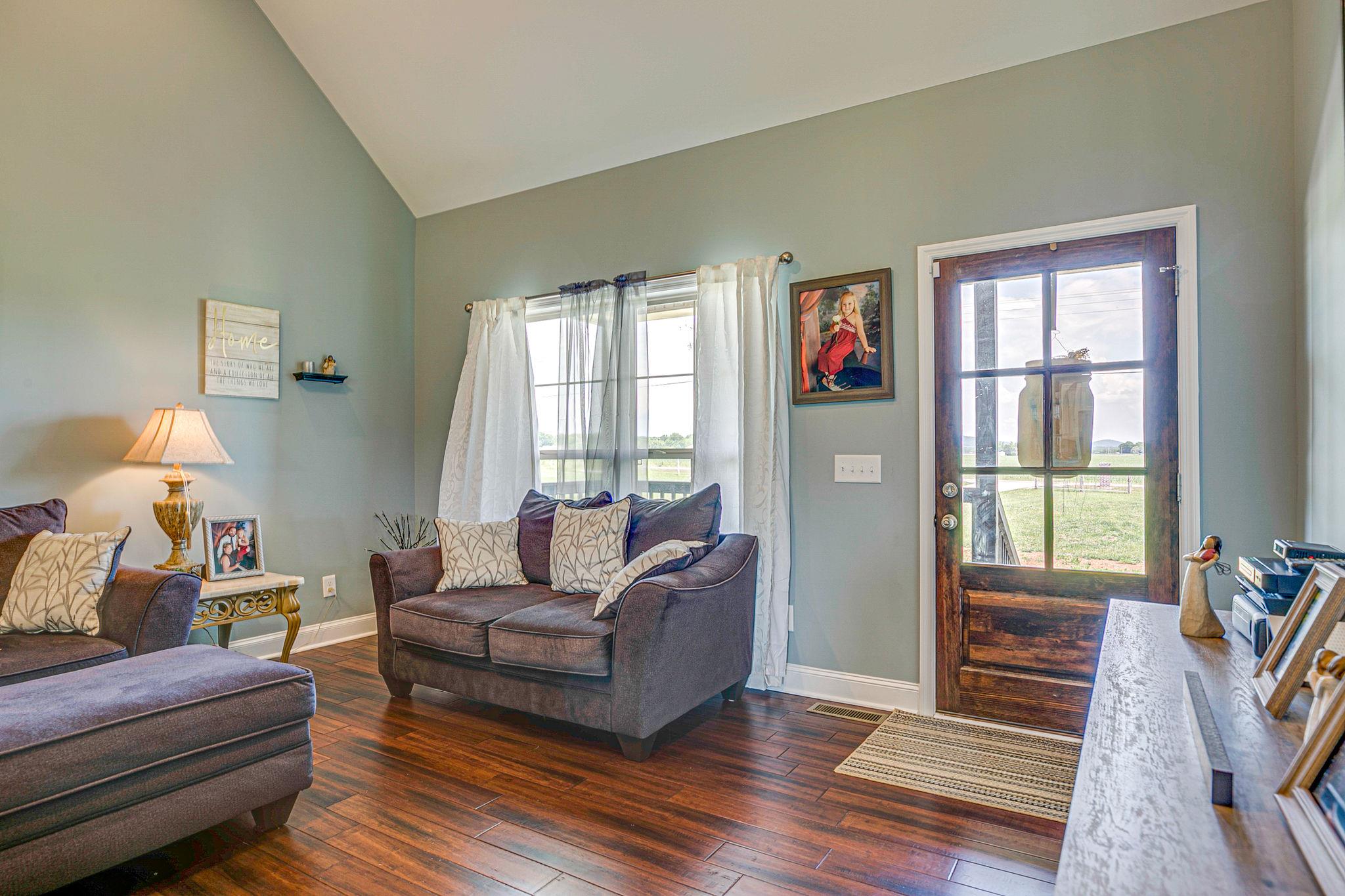 3269 Midland Road Bell Buckle, TN 37020 - Photo 5 of 30 a living room with furniture and a window