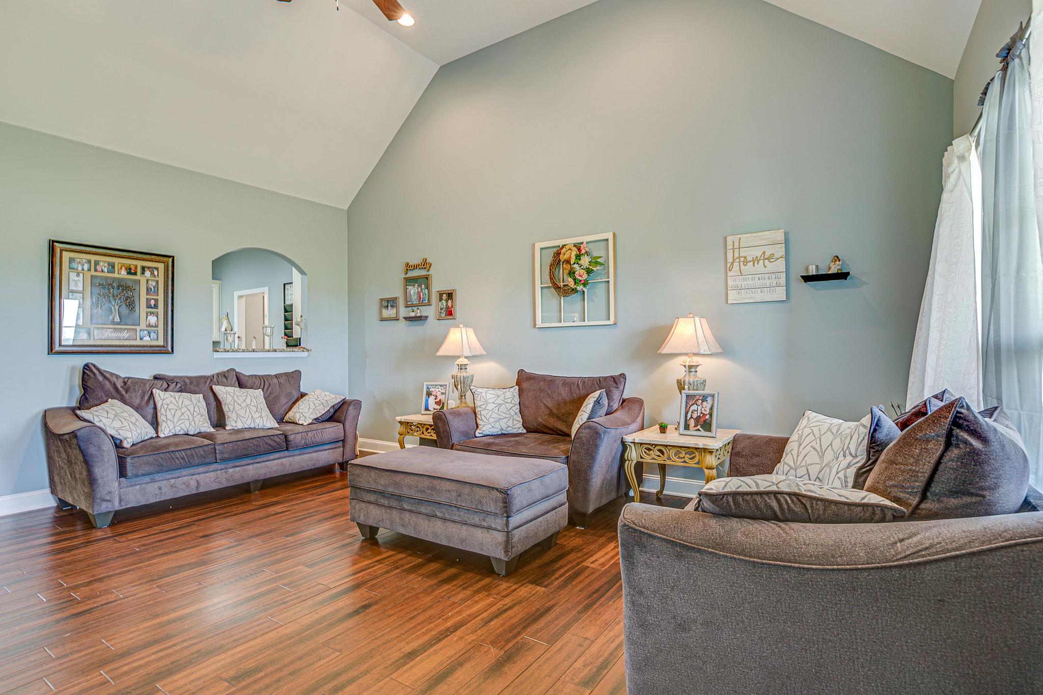 3269 Midland Road Bell Buckle, TN 37020 - Photo 6 of 30 a living room with furniture and a lamp