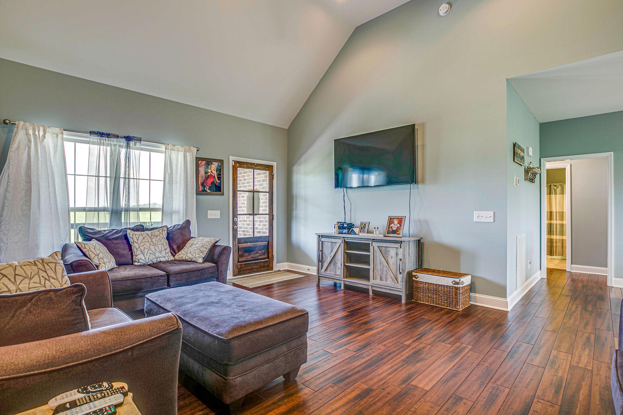 3269 Midland Road Bell Buckle, TN 37020 - Photo 7 of 30 a living room with furniture and a flat screen tv