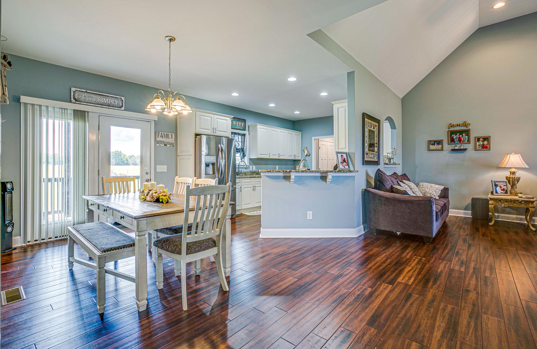 3269 Midland Road Bell Buckle, TN 37020 - Photo 9 of 30 a living room with dining room and wooden floor