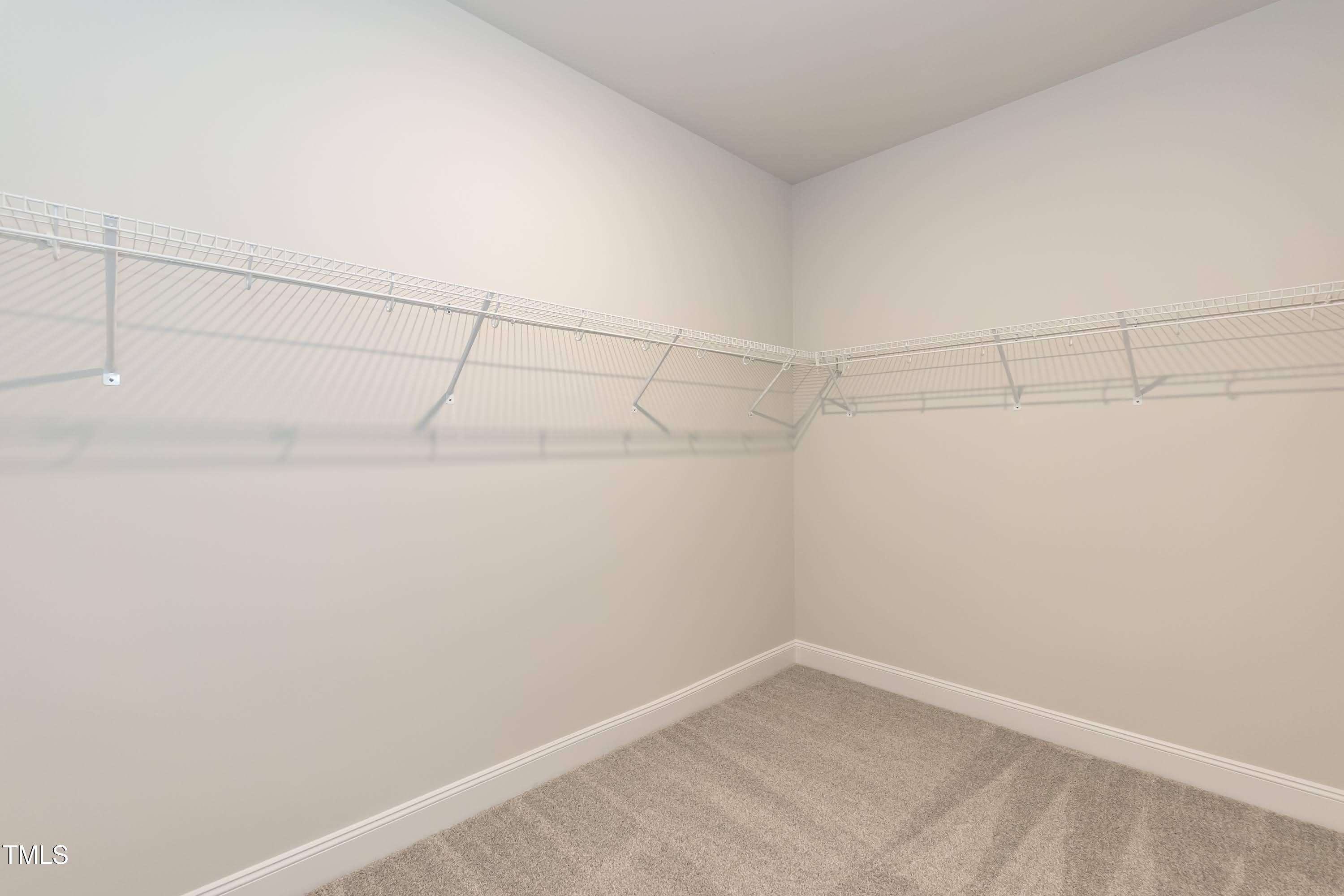 56 Braddock Court Garner, NC 27529 - Photo 22 of 55 a view of a room with racks on the wall