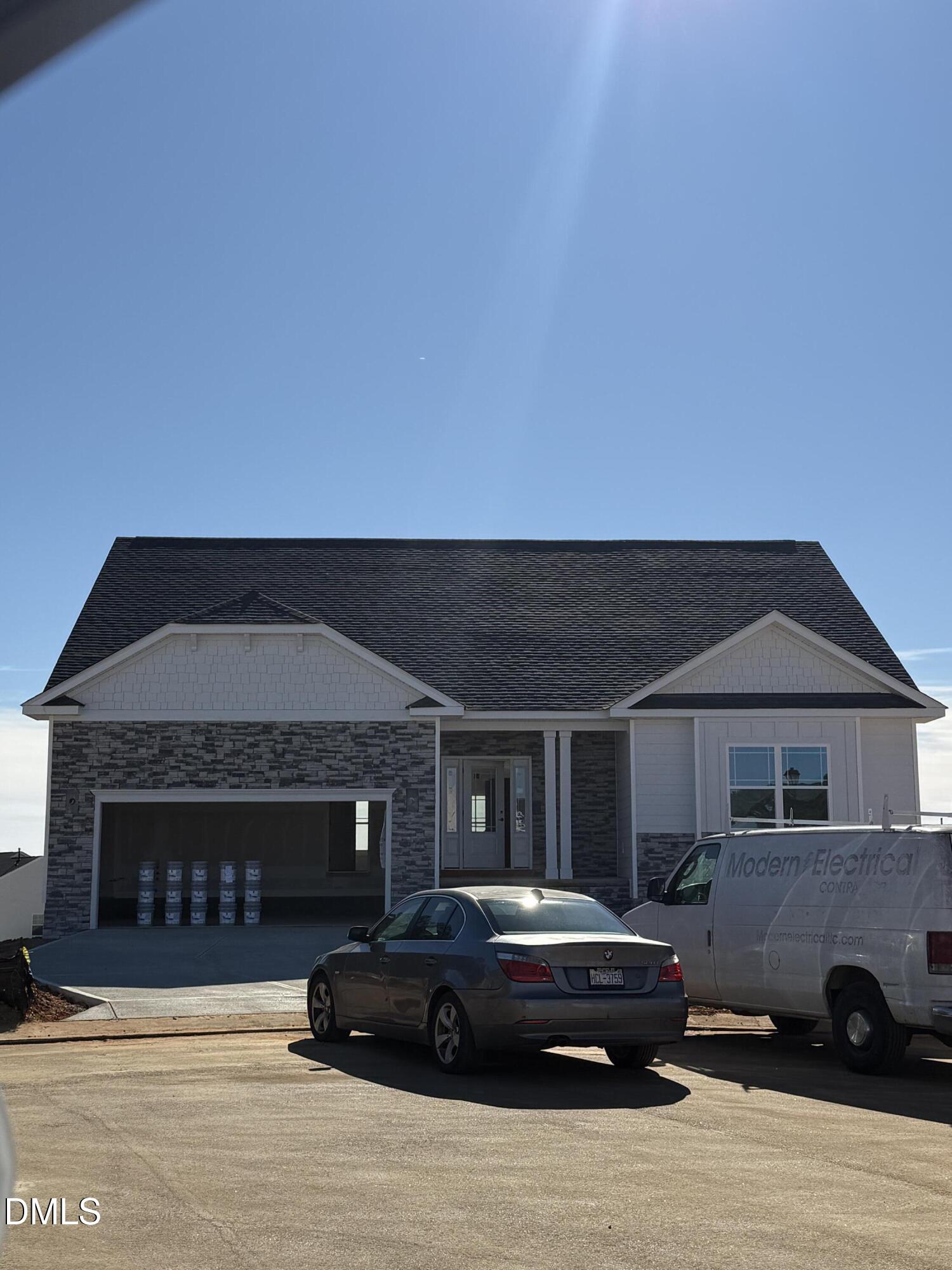 56 Braddock Court Garner, NC 27529 - Photo 2 of 55 a front view of a house with parking space