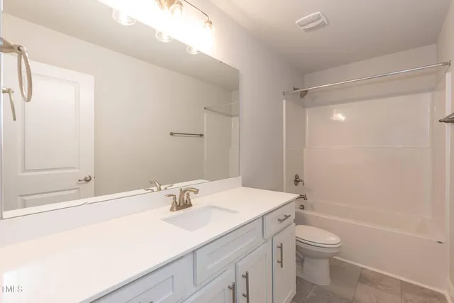 a view of a room with window and stairs