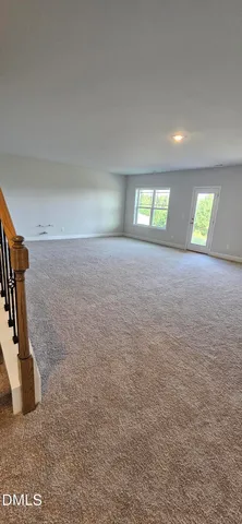 a view of a room with an empty space