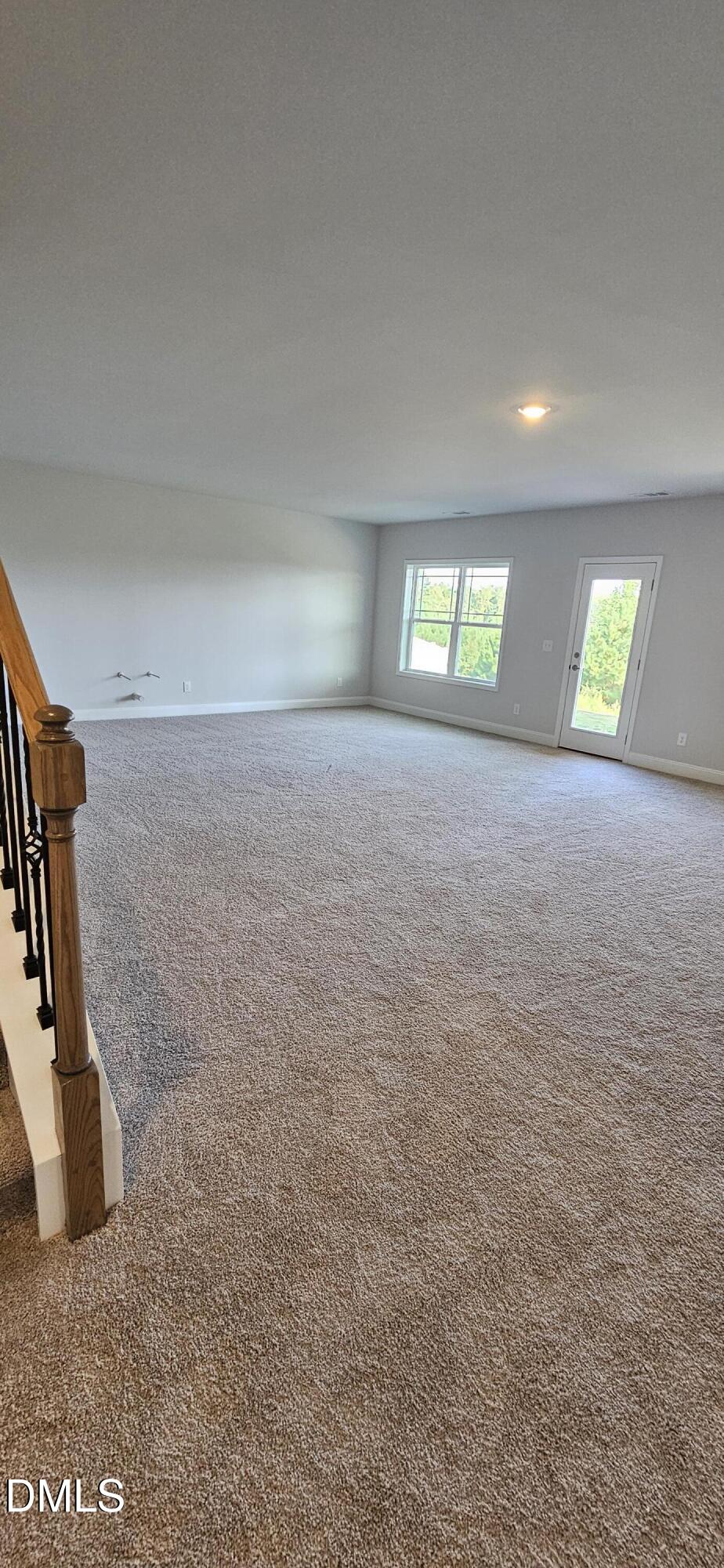 56 Braddock Court Garner, NC 27529 - Photo 34 of 55 a view of a room with window and stairs
