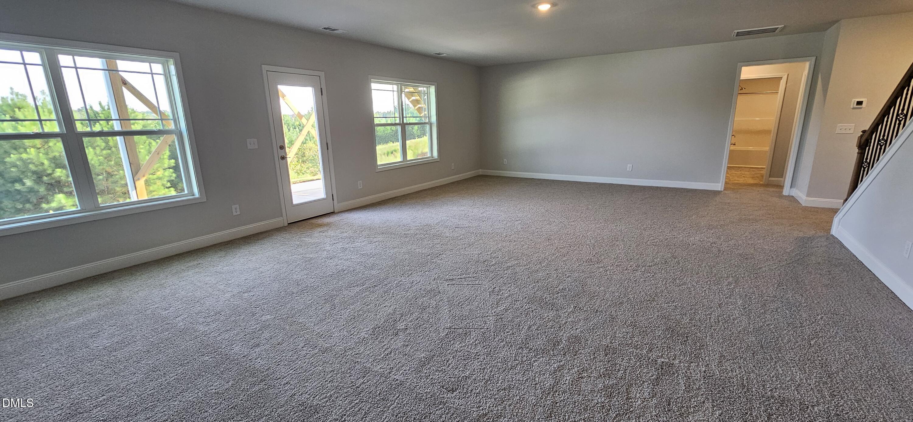 56 Braddock Court Garner, NC 27529 - Photo 35 of 55 a view of an empty room with a window