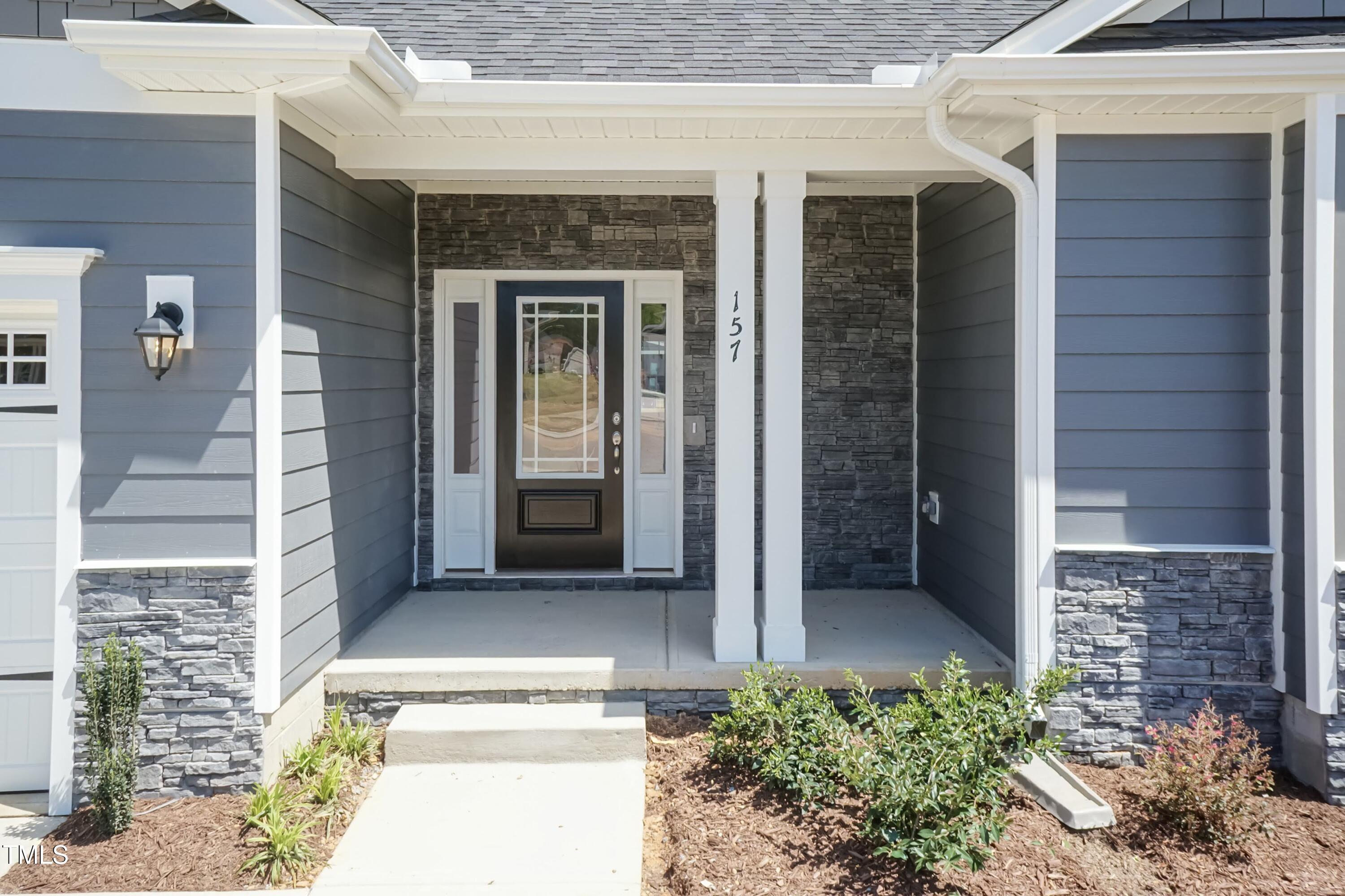 56 Braddock Court Garner, NC 27529 - Photo 6 of 55 a view of front door of house and an entrance