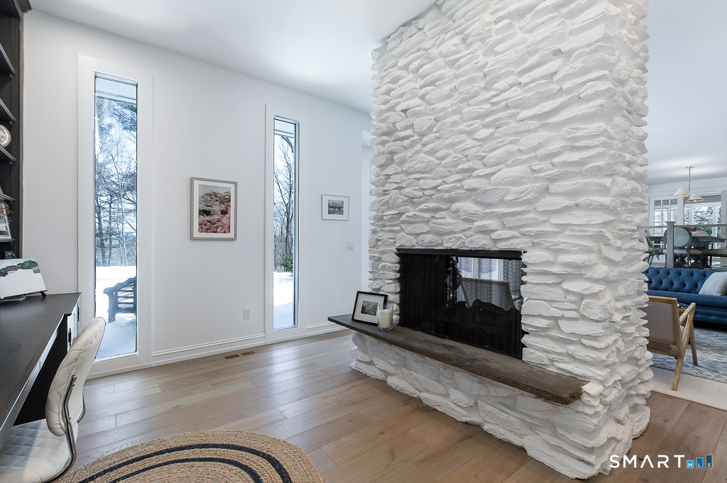 34 Milan Road Woodbridge, CT 06525 - Photo 9 of 40 Back side of the 2-sided gas fireplace