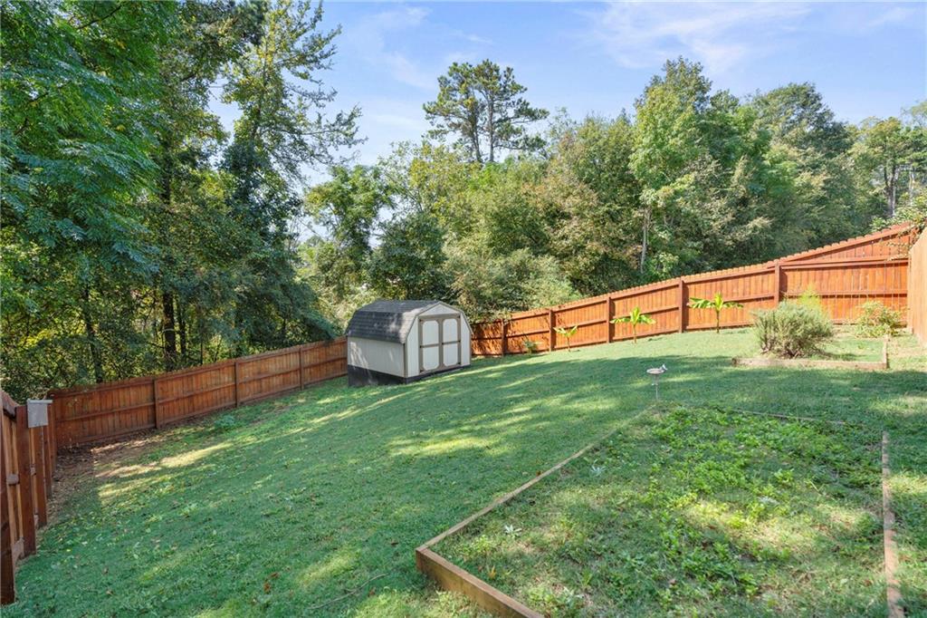 420 Andrew Ridge Drive Jefferson, GA 30549 - Photo 14 of 26 a view of a backyard with plants and a park