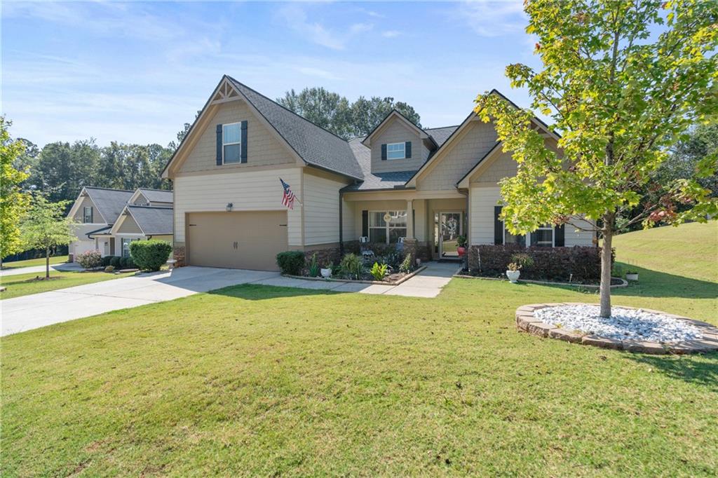 420 Andrew Ridge Drive Jefferson, GA 30549 - Photo 16 of 26 a front view of a house with a yard