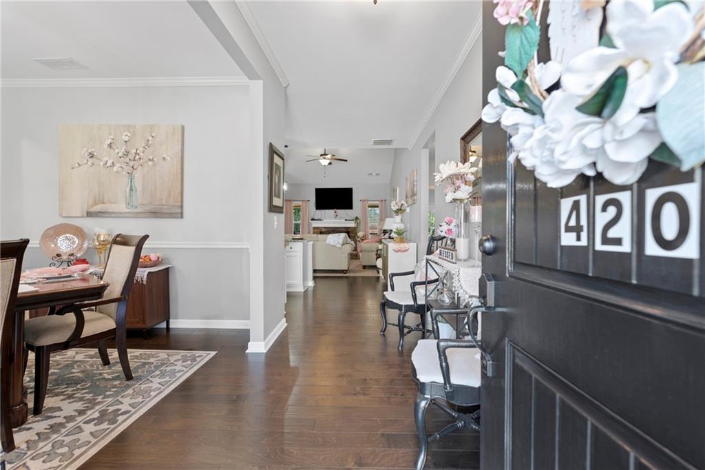 420 Andrew Ridge Drive Jefferson, GA 30549 - Photo 25 of 26 a view of a dining room with furniture and wooden floor